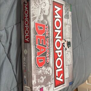 New! Monopoly The Walking Dead survival edition game. New but not in plastic